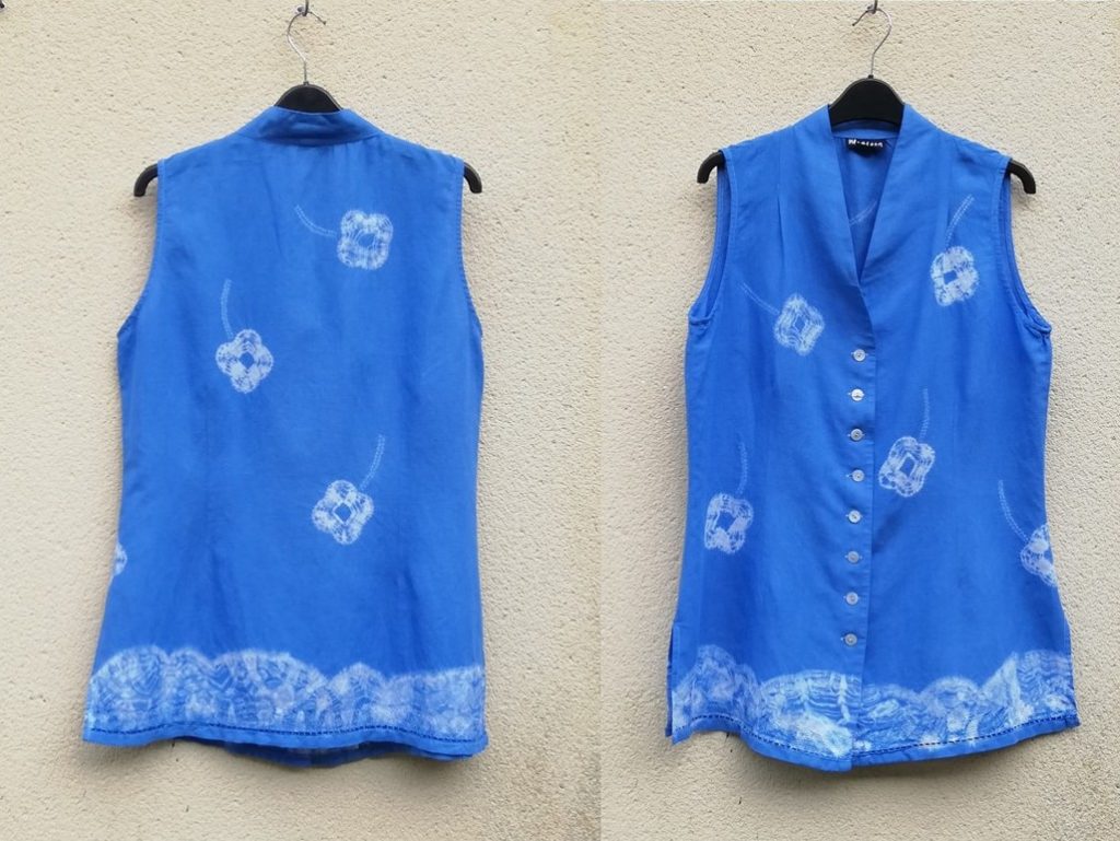 A repurposed top using shibori. Back and front images in blue.