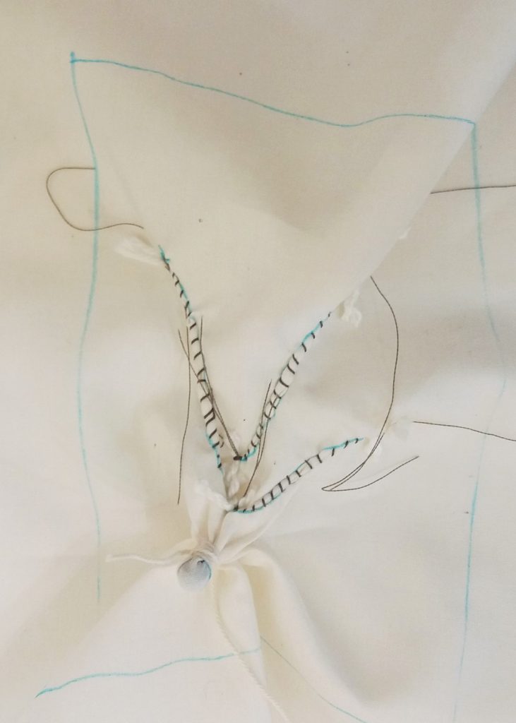 4 Designs to Discover and Learn in Guntai Stitched Shibori 9 Plain undyed fabric showing guntai stitch plus a bead tied in