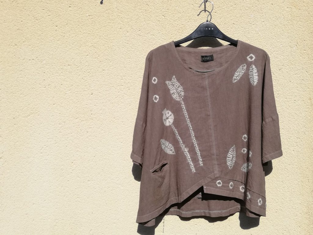 A soft brown colour top with a white shibori resist design