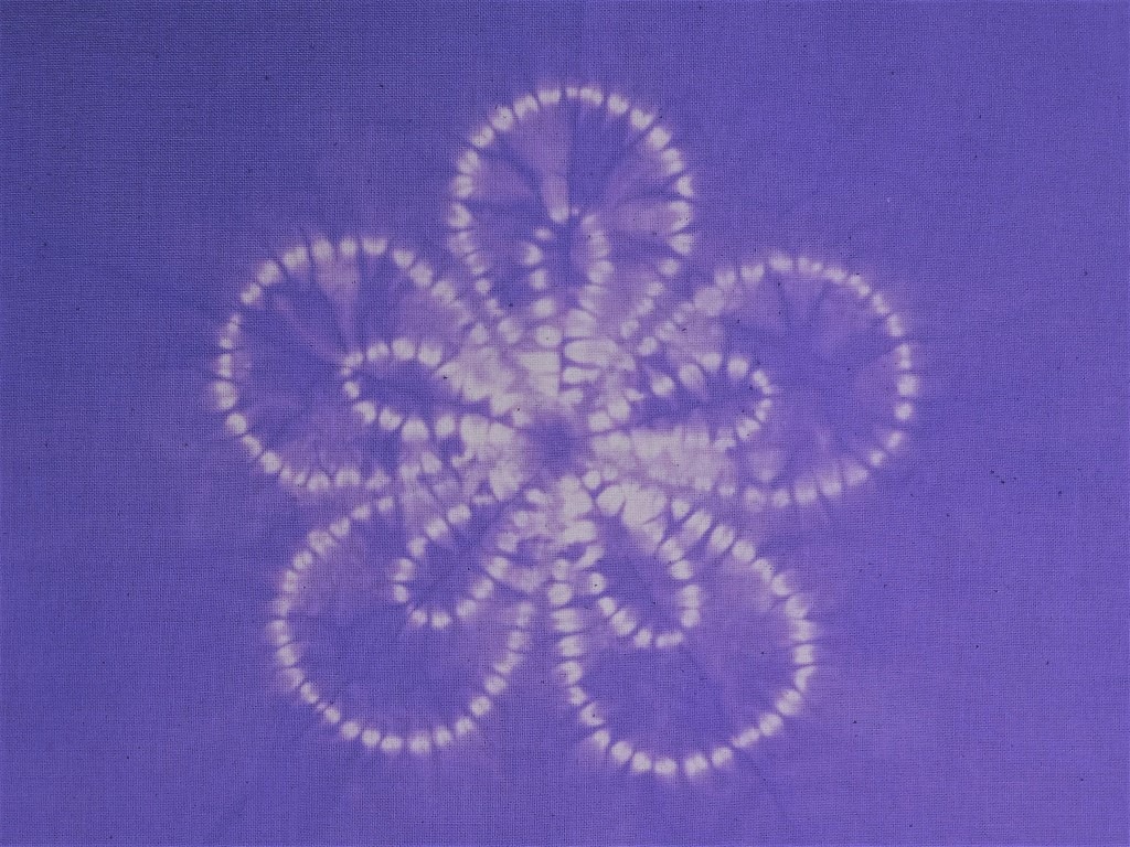 Simple ori-nui geranium pattern as sewn on quilted jacket pockets