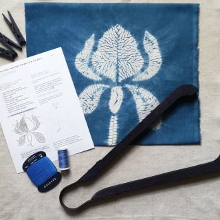white shibori design on blue