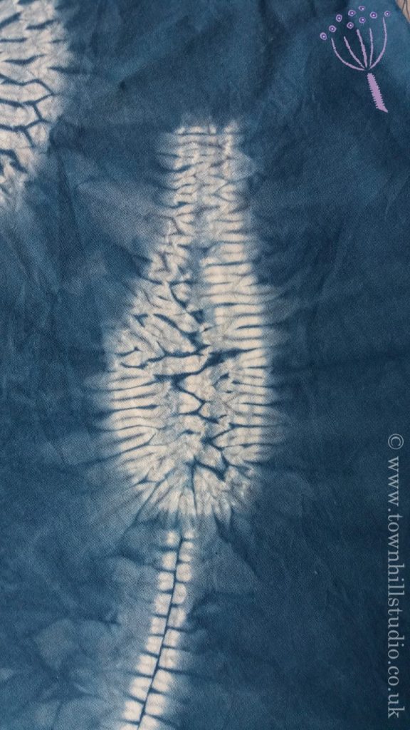 shibori stitched design using two needles